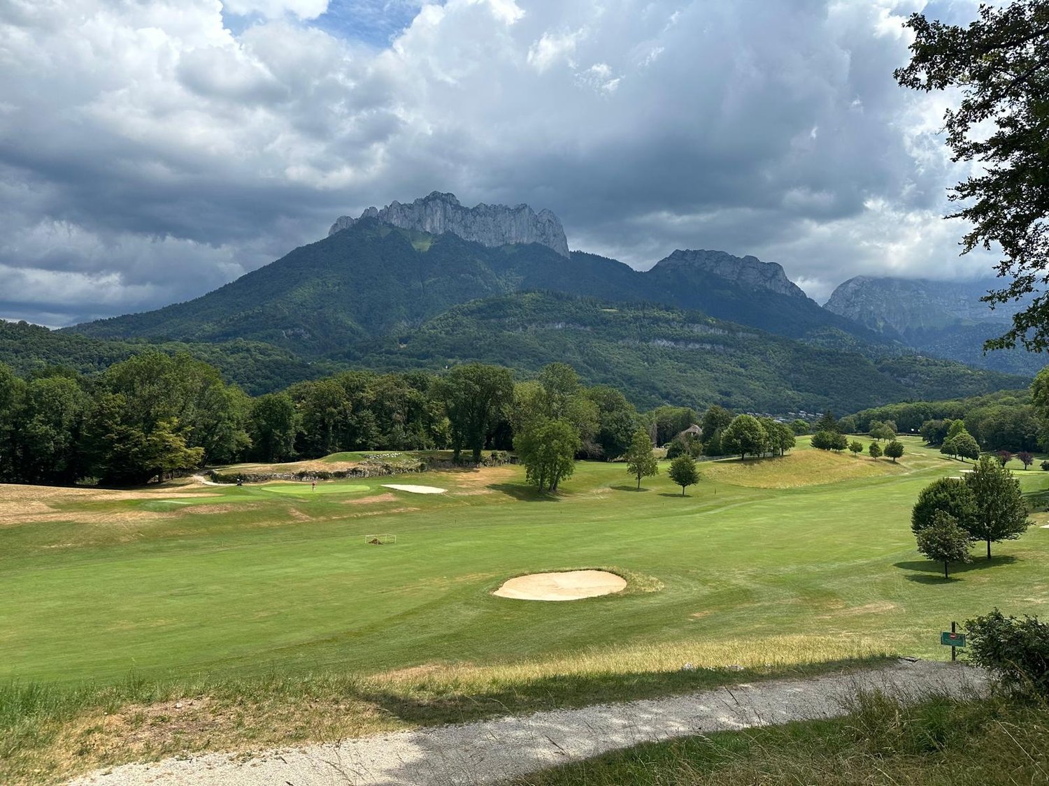 Original photo of three golfers at Golf du Lac d'Annecy