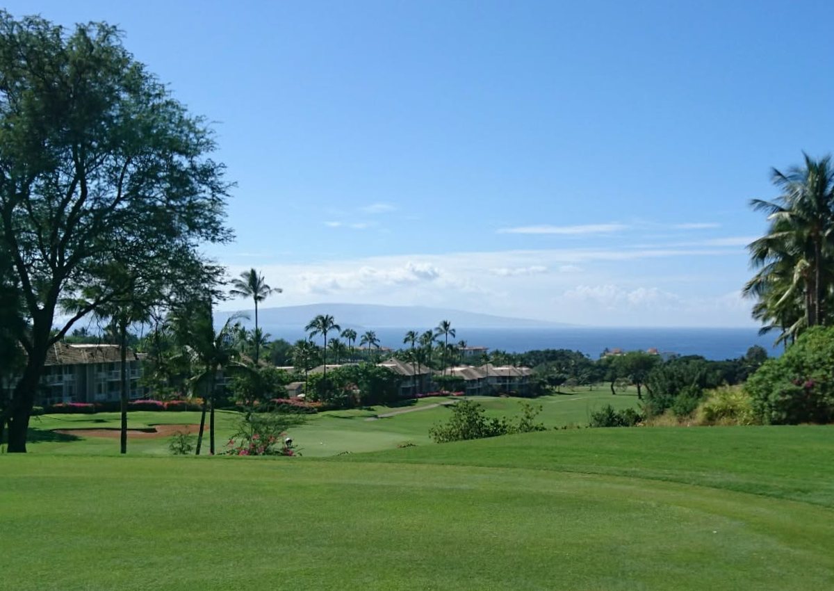 Original phone photo looking across a Maui course and resort to the ocean