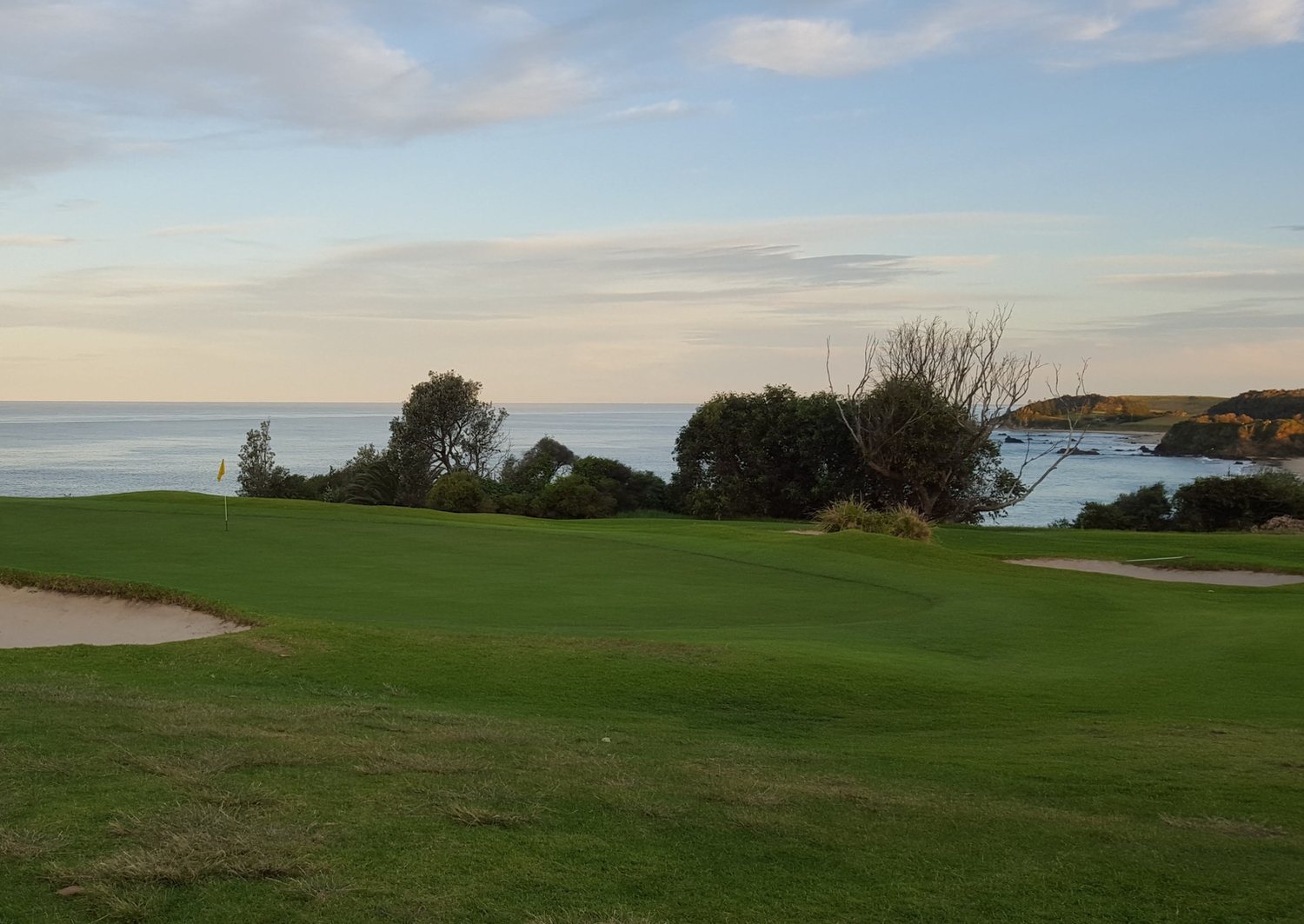 Original phone photo of the clifftop green above the ocean at Narooma
